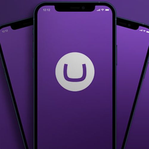 An image of multiple phones with the Umbraco logo with a purple background